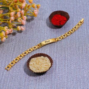 Custom Engraved Golden Metal Rakhi Bracelet – Elegant & Durable